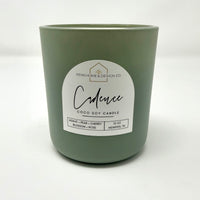 12 oz scented soy candle in green glass jar, front label