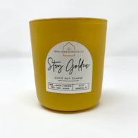 Yellow Stay Golden 12 oz coco soy candle in glass jar with front label